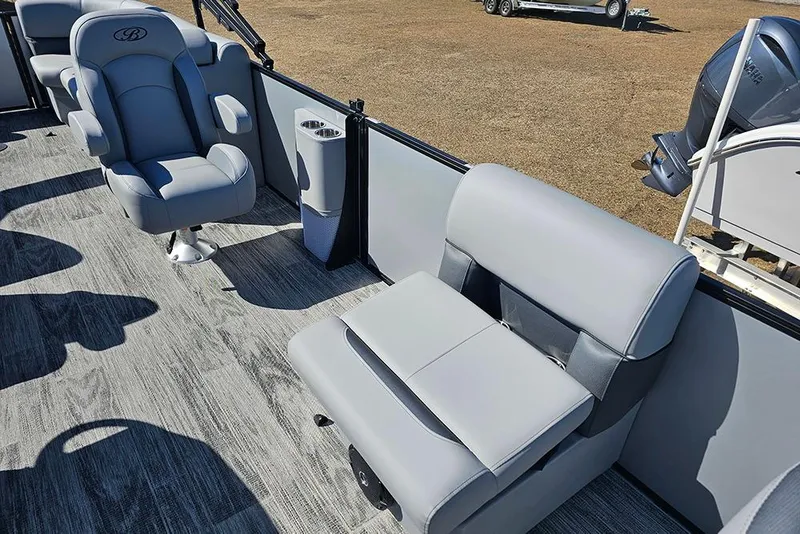 Slide: The Image of 2026 Bentley Pontoons 243 Fish CWT interior with gray seating and flooring. - 15