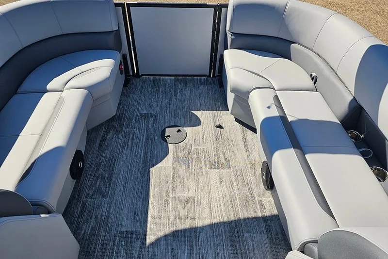 Slide: The Image of 2026 Bentley Pontoons 243 Fish CWT interior with gray seating and flooring. - 20