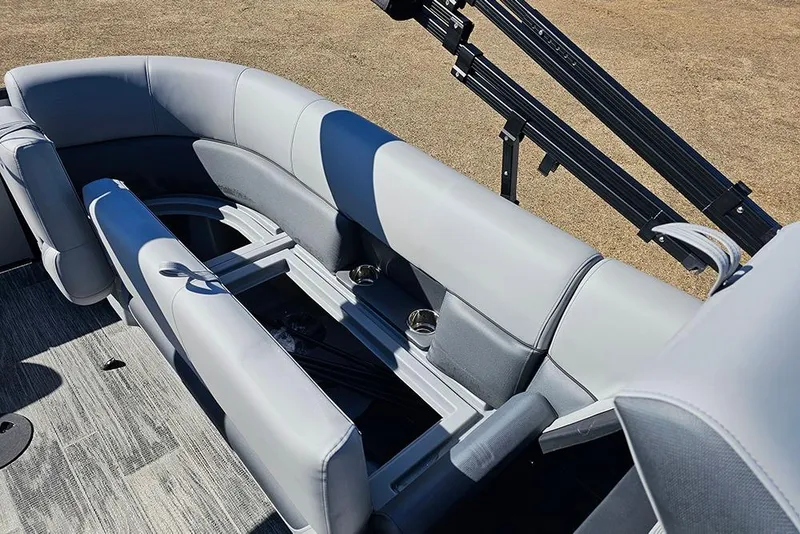 Slide: The Image of 2026 Bentley Pontoons 243 Fish CWT interior seating with storage and cup holders. - 21