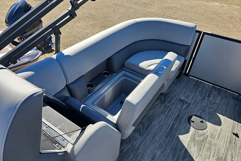 Slide: The Image of 2026 Bentley Pontoons 243 Fish CWT interior with gray seating and built-in cup holders. - 22