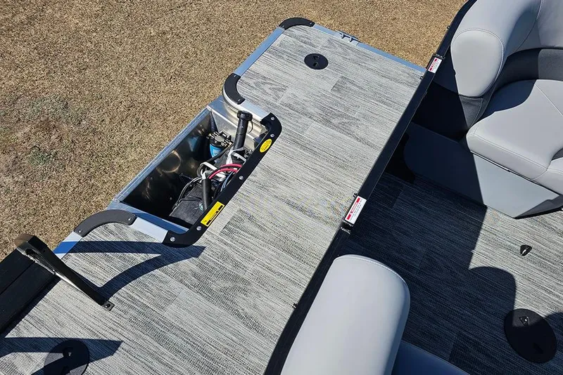 Slide: The Image of 2026 Bentley Pontoons 243 Fish CWT interior with seating and storage compartment. - 23