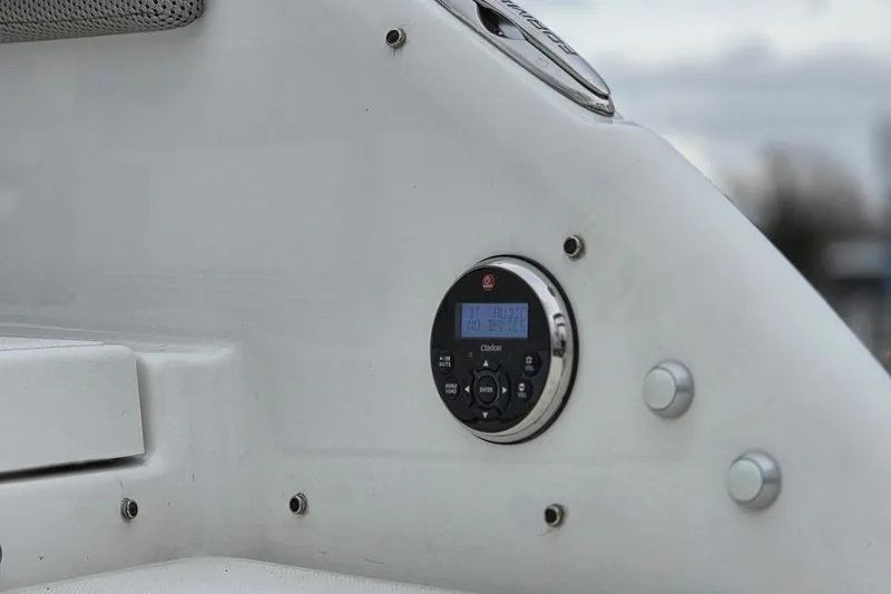 Slide: The Image of 2022 Formula 270 Bowrider dashboard with Clarion audio system controls. - 25