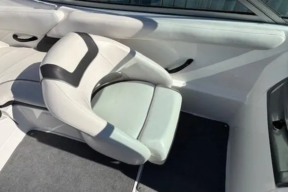 Slide: The Image of 2012 Yamaha Boats SX190 interior with white and black seating. - 19