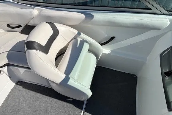 Slide: The Image of Interior of a 2012 Yamaha Boats SX190, featuring white and black seating. - 20