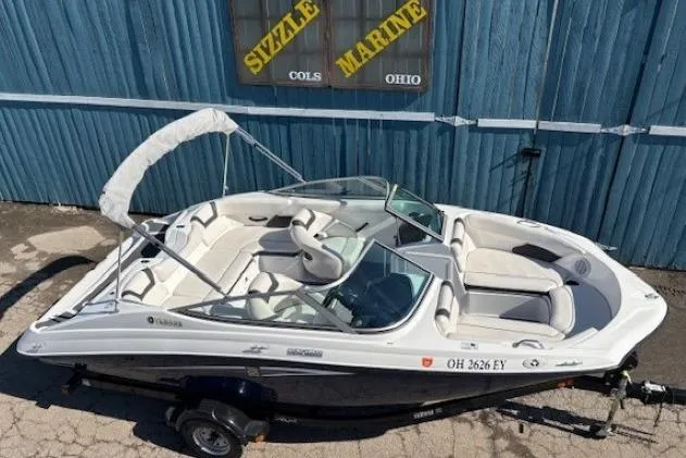 Slide: The Image of 2012 Yamaha SX190 boat with white interior, parked outside Sizzle Marine, Ohio. - 6