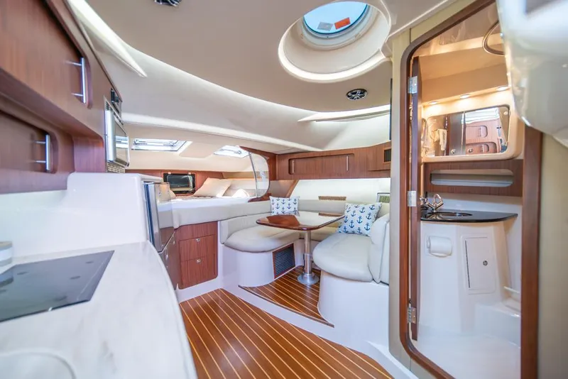 Slide: The Image of Luxurious interior of 2019 Grady-White Express boat with modern amenities and elegant design. - 13