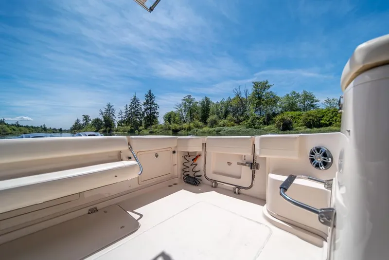 Slide: The Image of 2019 Grady-White Express boat interior with scenic outdoor view. - 34