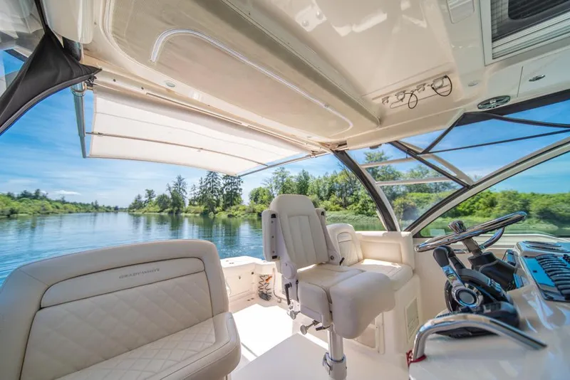 Slide: The Image of 2019 Grady-White Express boat interior with scenic river view. - 40