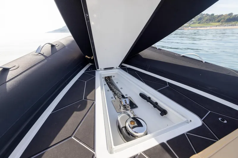 Slide: The Image of 2026 Highfield Sport 800 boat anchor compartment with sleek design and modern features. - 13