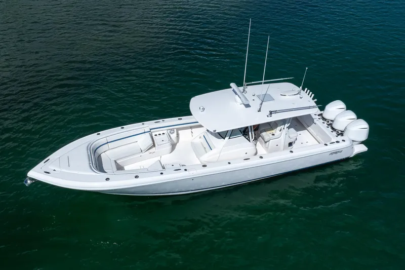 Slide: The Image of 2017 Intrepid 375 Center Console boat on calm water, aerial view. - 23