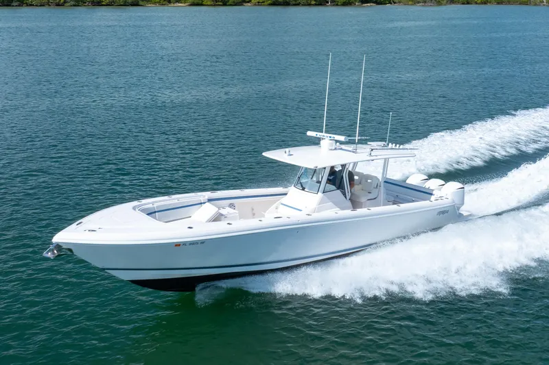 Slide: The Image of 2017 Intrepid 375 Center Console boat cruising on open water. - 26