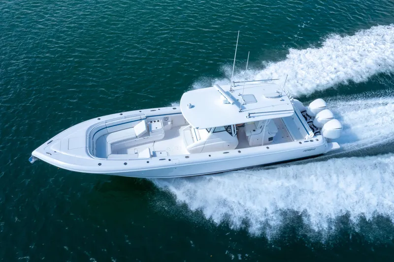 Slide: The Image of 2017 Intrepid 375 Center Console boat cruising on open water. - 28