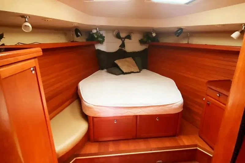 Slide: The Image of Luxurious cabin interior of 2012 Hunter Aft Cockpit 50 yacht with cozy bed. - 24