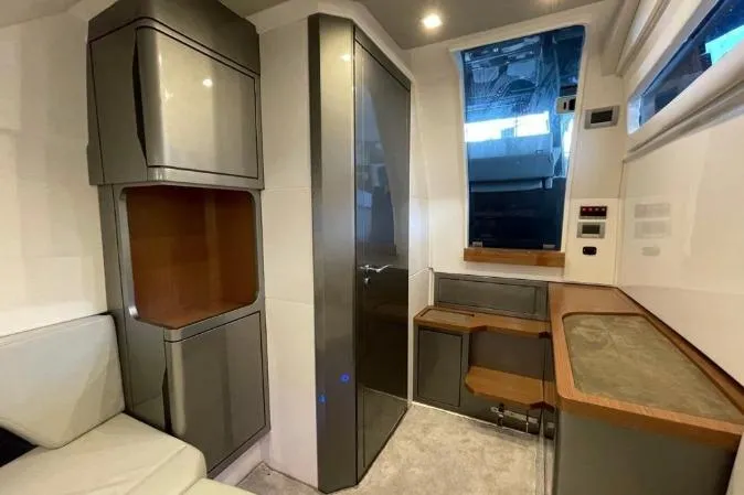 Slide: The Image of Modern interior of 2027 Schaefer V34 yacht with sleek cabinetry and seating. - 12