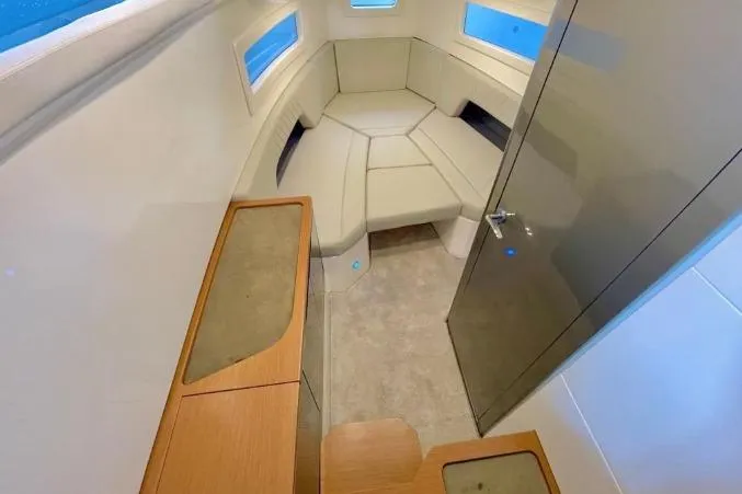 Slide: The Image of Luxurious interior of 2027 Schaefer V34 yacht with modern seating and sleek design. - 14