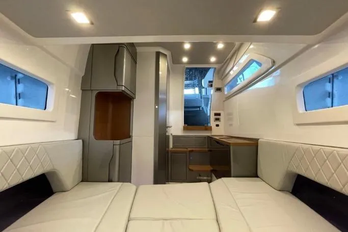 Slide: The Image of Luxurious interior of 2027 Schaefer V34 yacht with modern furnishings and ambient lighting. - 15