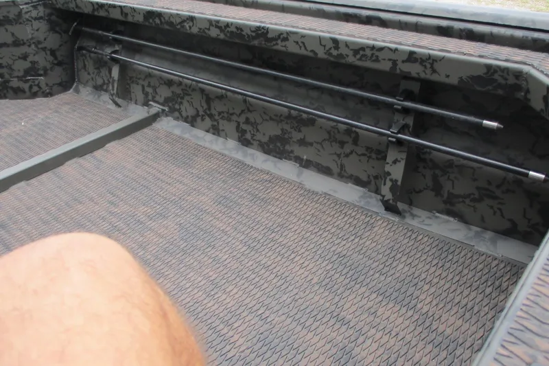 Slide: The Image of Interior of 2026 Gator Tail 1854 Extreme boat with camouflage design and textured flooring. - 10