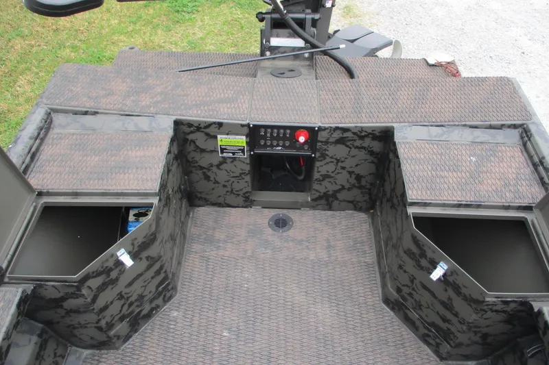 Slide: The Image of 2026 Gator Tail 1854 Extreme boat interior with storage compartments and control panel. - 6