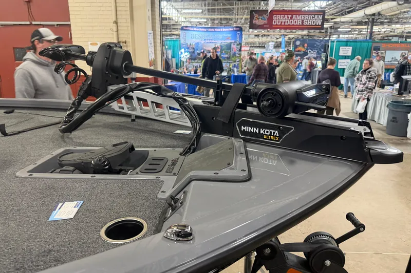 Slide: The Image of 2026 Vexus AVX 1985s boat with Minn Kota Ultrex motor at outdoor show. - 3