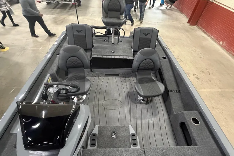 Slide: The Image of 2026 Vexus AVX 1985s boat interior with seating and steering console. - 6