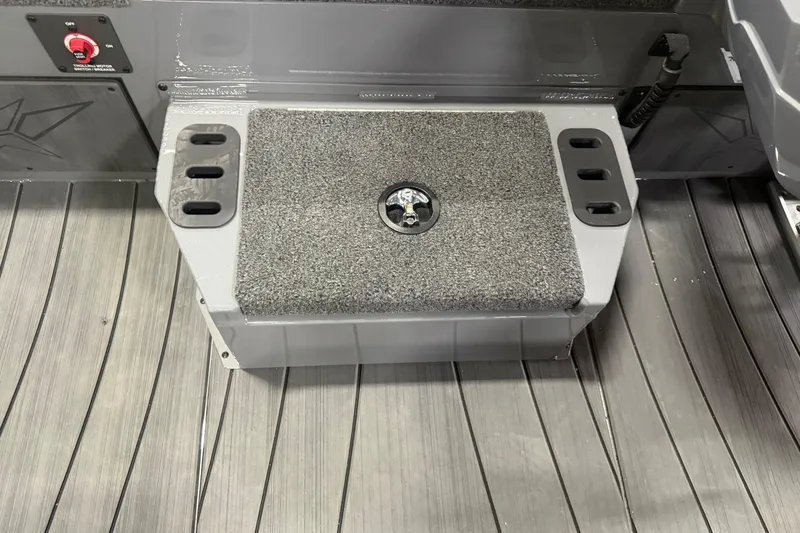 Slide: The Image of 2026 Vexus AVX 1985s boat step with carpeted surface and storage compartments. - 8