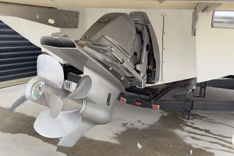 Slide: The Image of 2010 Colbalt 242 boat with a detailed view of the propeller and engine. - 5