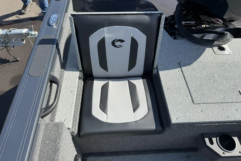 Slide: The Image of 2026 Crestliner 1850 Fish Hawk WT boat seat, gray and black design. - 9