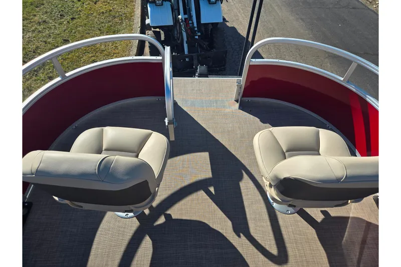 Slide: The Image of 2024 Sun Tracker Bass Buggy 16 XL Select pontoon boat with two beige seats. - 21