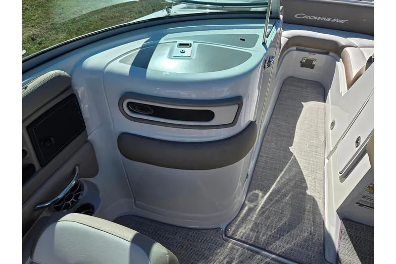 Slide: The Image of Interior of 2020 Crownline Eclipse E235 boat, featuring sleek design and comfortable seating. - 16