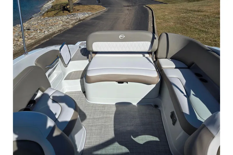 Slide: The Image of 2020 Crownline Eclipse E235 boat interior with comfortable seating and elegant design. - 27