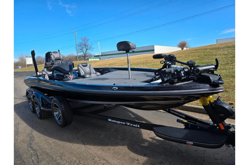 Slide: The Image of 2021 Ranger Z521L bass boat on trailer, parked on a sunny day. - 5