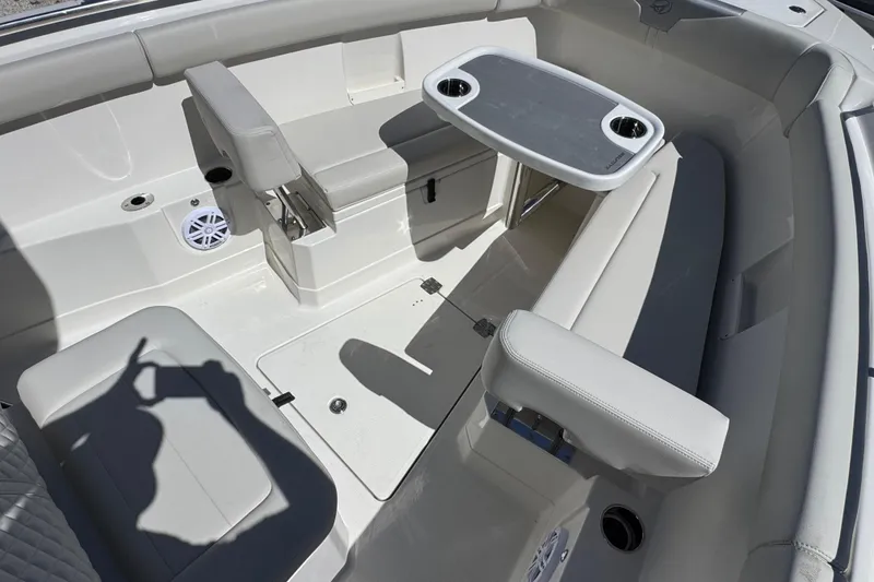 Slide: The Image of 2026 Sailfish 272 CC boat interior with seating and table setup. - 20