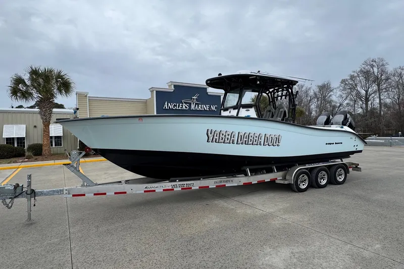 The Image of 2024 Cape Horn 32 XS boat on trailer at Anglers Marine NC dealership. - 0