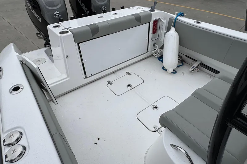 Slide: The Image of 2024 Cape Horn 32 XS boat interior with seating and storage compartments. - 10