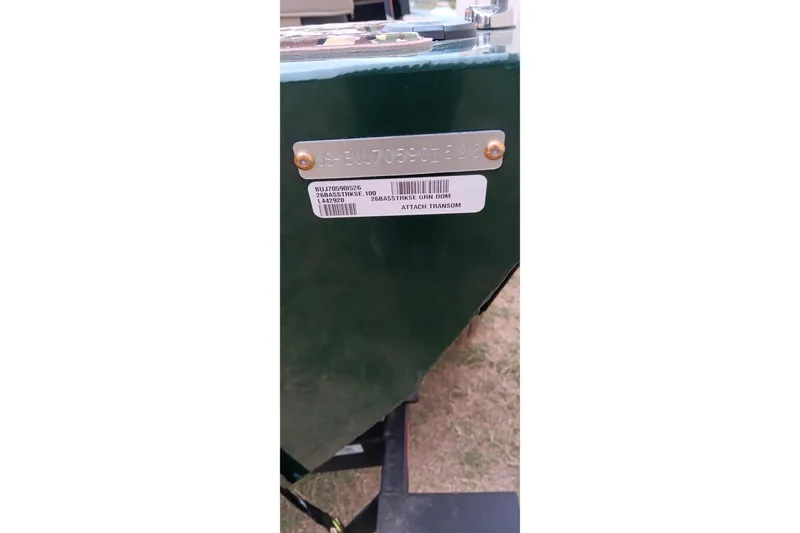 Slide: The Image of 2026 Tracker Bass Tracker Classic Limited boat transom with identification plate. - 7