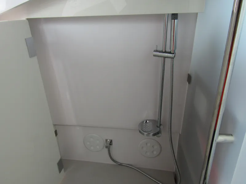 Slide: The Image of Shower area in 2024 Axopar 37XC CROSS CABIN boat. - 27