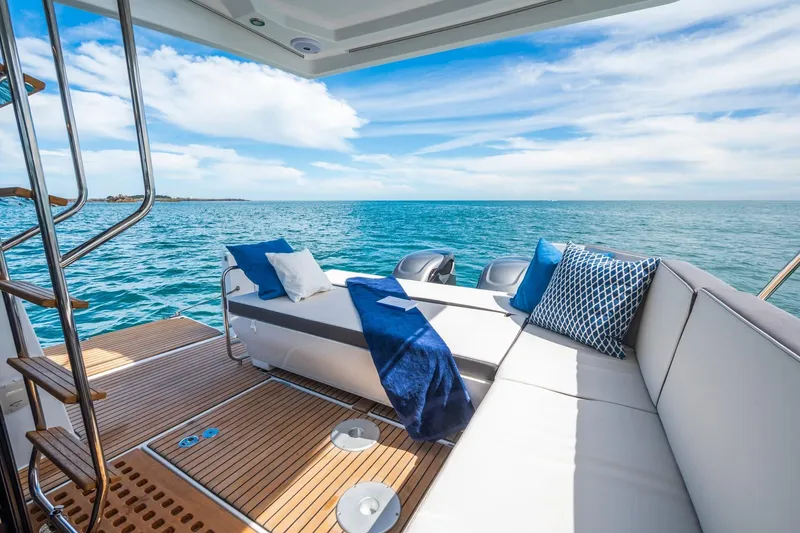 Slide: The Image of Luxurious 2026 Beneteau Antares 11 yacht deck with ocean view and comfortable seating. - 7