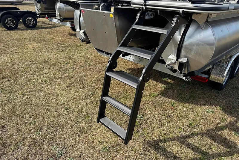 Slide: The Image of 2026 Bentley Pontoons Elite 253 Tritoon with ladder on grass. - 10