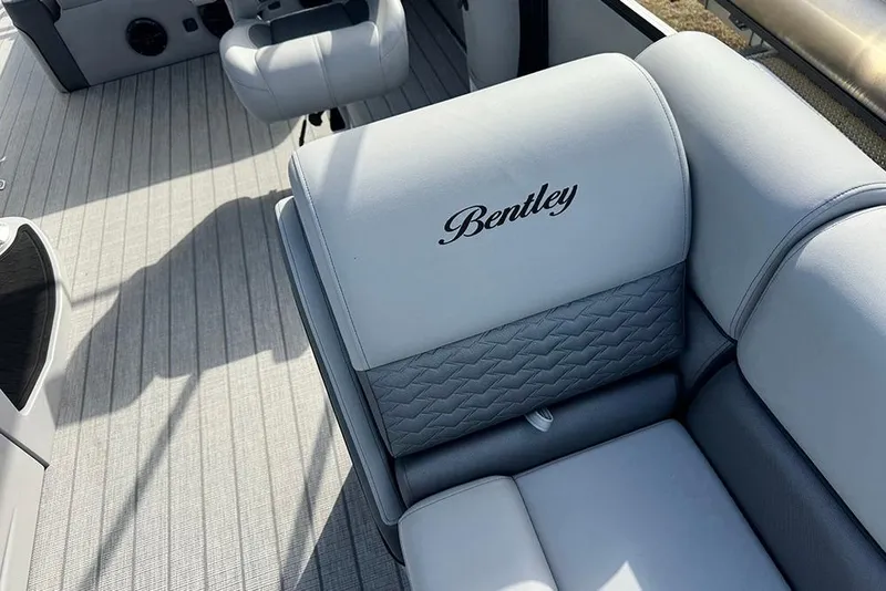 Slide: The Image of Luxurious seating on 2026 Bentley Pontoons Elite 253 Swingback Dual Captain Full Tritoon. - 14