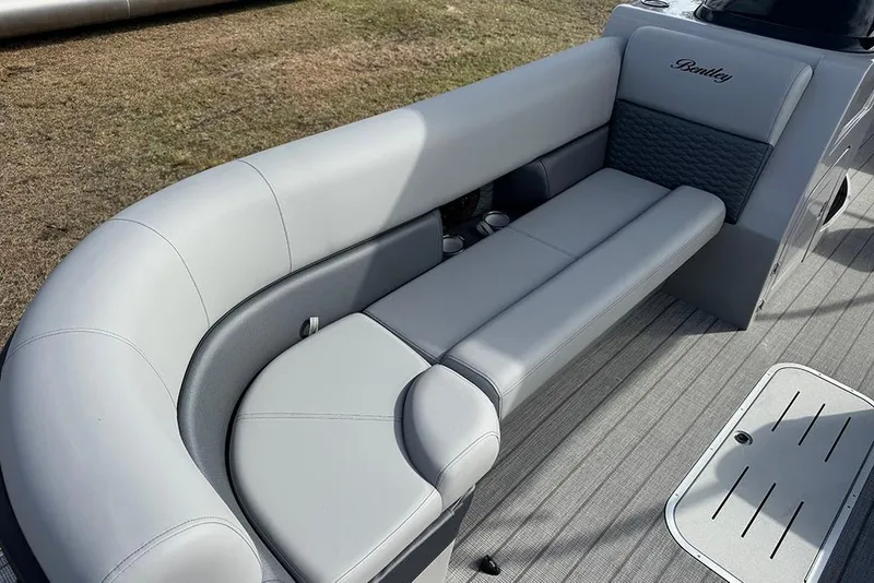 Slide: The Image of 2026 Bentley Pontoons Elite 253 Swingback Tritoon, luxurious seating detail. - 16