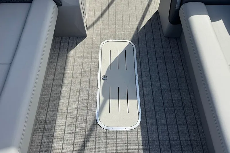 Slide: The Image of 2026 Bentley Pontoons Elite 253 interior flooring with sleek design and modern finish. - 18