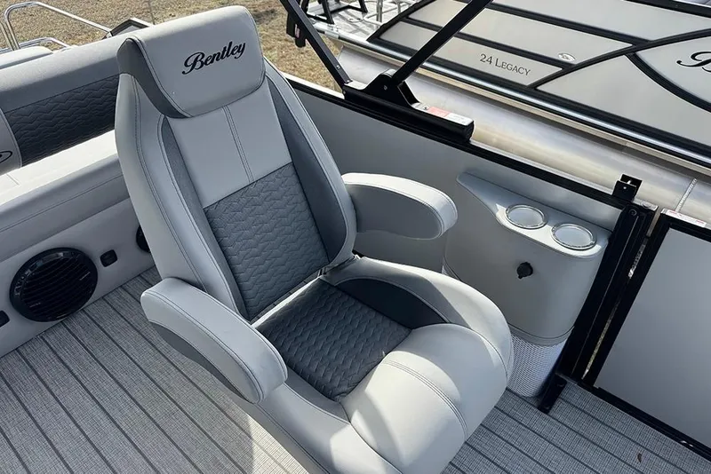 Slide: The Image of Luxurious seating on 2026 Bentley Pontoons Elite 253 Swingback Dual Captain Full Tritoon. - 26