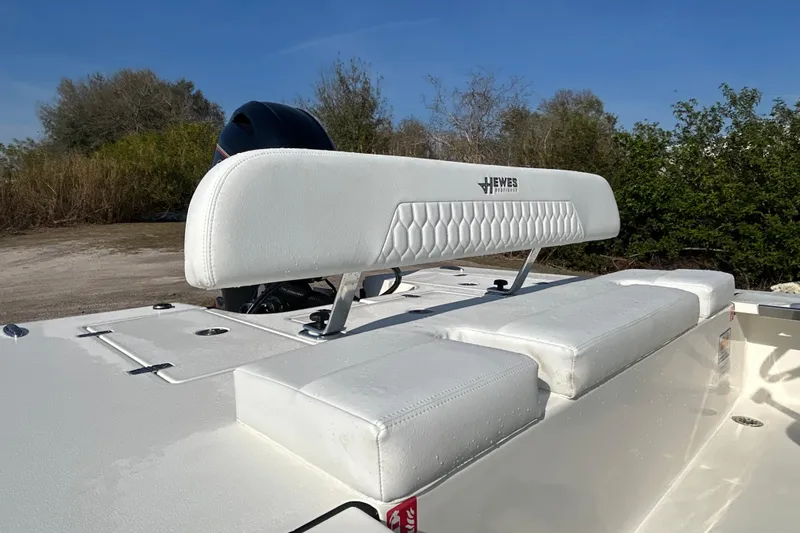 Slide: The Image of 2026 Hewes Redfisher 16 boat with white seating and sleek design. - 10