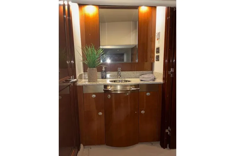 Slide: The Image of Luxurious bathroom interior of 2008 Sea Ray 48 Sundancer yacht with elegant wood finish. - 11