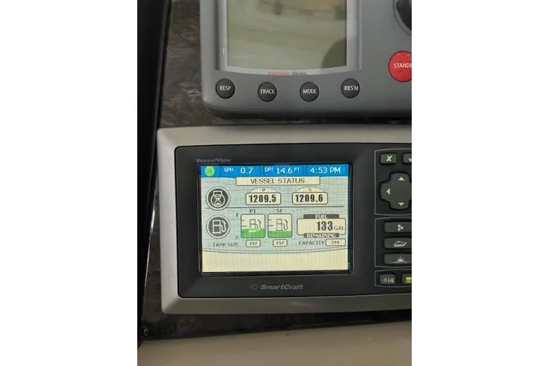 Slide: The Image of SmartCraft display on 2008 Sea Ray 48 Sundancer showing vessel status and fuel information. - 16