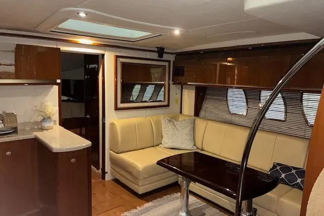 Slide: The Image of Luxurious interior of 2008 Sea Ray 48 Sundancer yacht with elegant seating and modern design. - 6