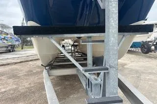 Slide: The Image of 2010 World Cat 290 DC boat on trailer, viewed from the rear. - 24