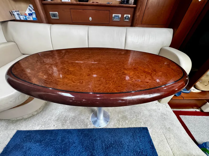 Slide: The Image of Luxurious wooden table in 2007 Sea Ray 40 Sundancer yacht interior. - 19