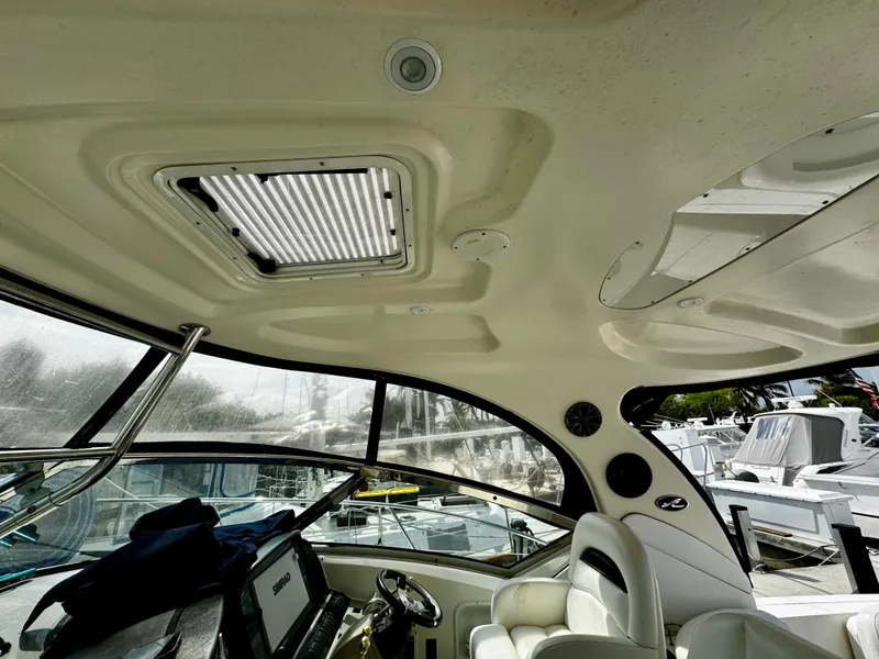 Slide: The Image of Interior view of 2007 Sea Ray 40 Sundancer yacht, featuring helm and seating area. - 35