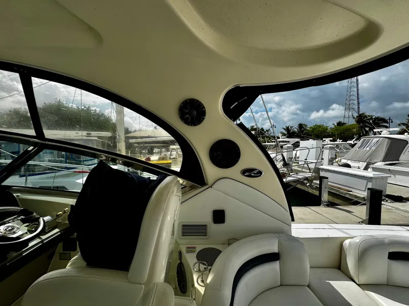 Slide: The Image of Interior view of 2007 Sea Ray 40 Sundancer yacht at marina. - 44